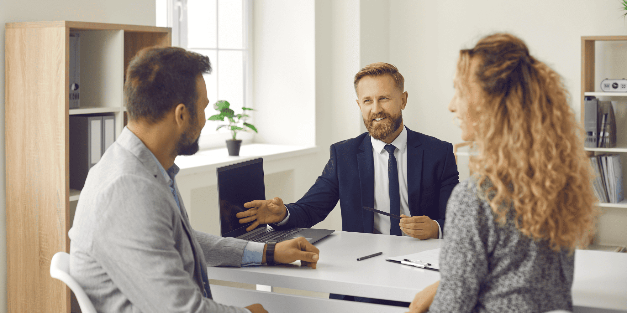 Stock Image of Couple Withdrawing From Savings to Remodel Home