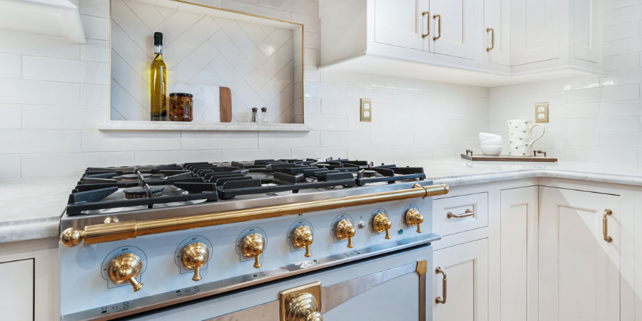 Gourmet Kitchen Renovation with Gas Range and Inset Stove Backsplash Shelf