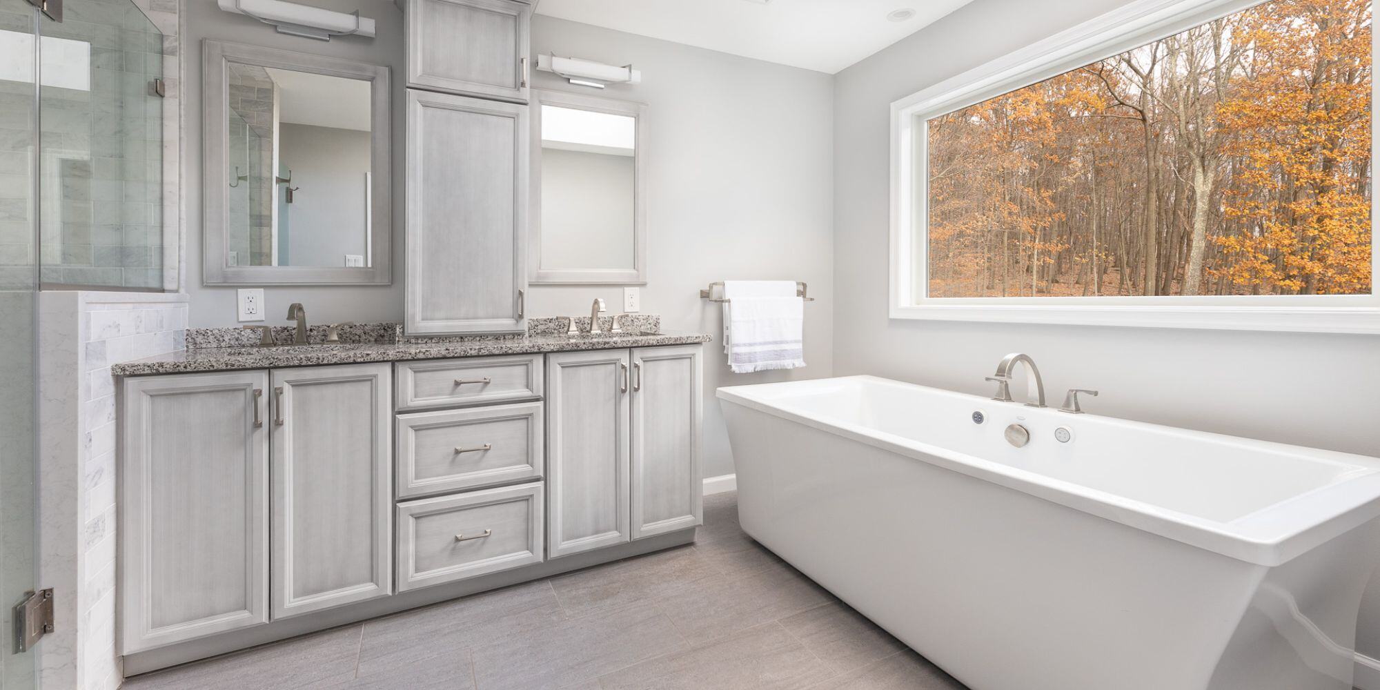 Soaking Tub in Bathroom Remodel with Double Vanities