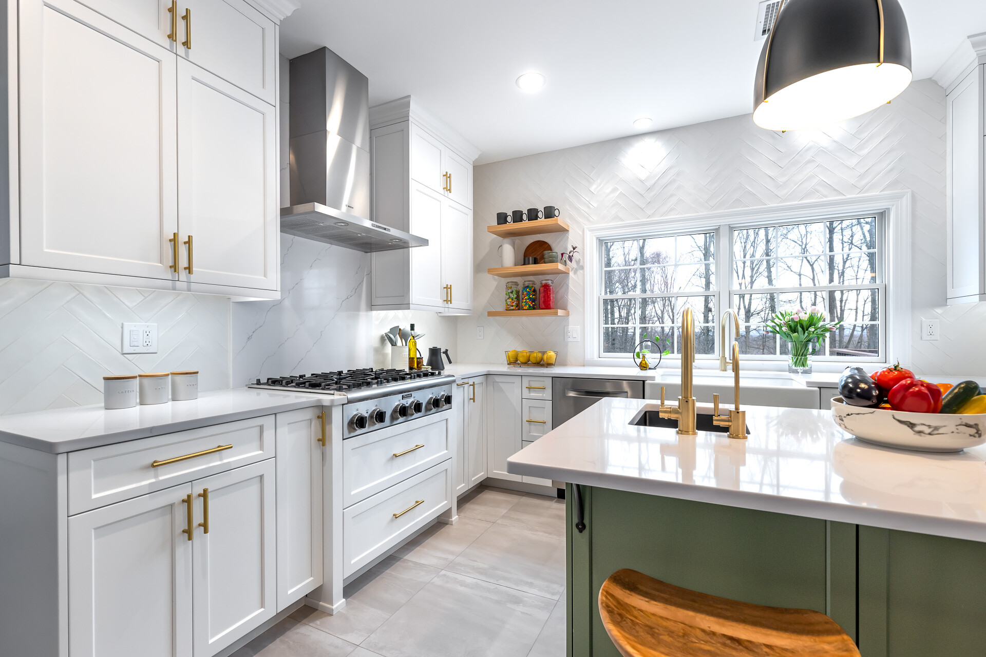 Kitchen with Herringbone Backsplash and Green Cabinets